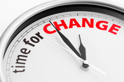 Close-up of a clock showing the words "Time For Change".